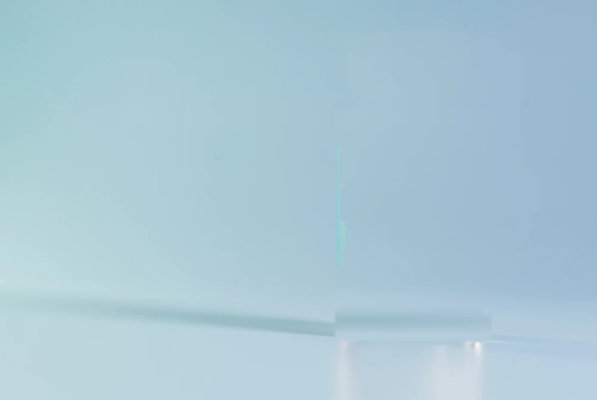 Kainos H₂O 10ML vial, photographed on a lacquer counter